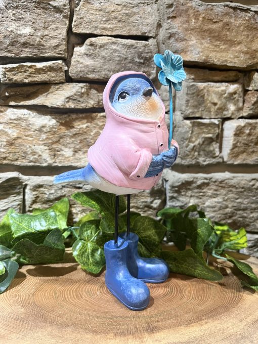 Blue Bird In Pink Raincoat